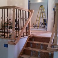 Stair and railing contractors at work