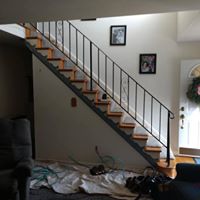 Stair contractors remodeling a staircase